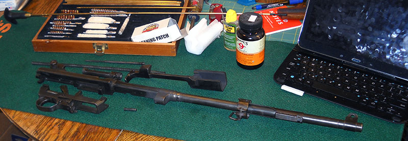 M1 carbine barreled action, fully disassembled for cleaning